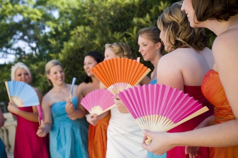 bridesmaids colourful paper fans